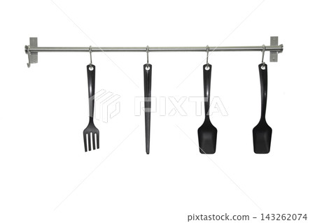 Set of Vintage kitchen utensil hanging on white background. Set of Vintage kitchen utensil hanging on white background. 143262074