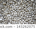abstract background with dry round white stones 143262075