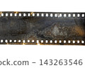 Damaged corroded 35mm film strip with perforations and residue 143263546