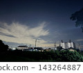 Clouds spreading over a residential area 143264887