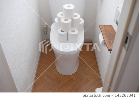 Toilet paper placed on the toilet seat Toilet paper placed on the toilet seat 143265341