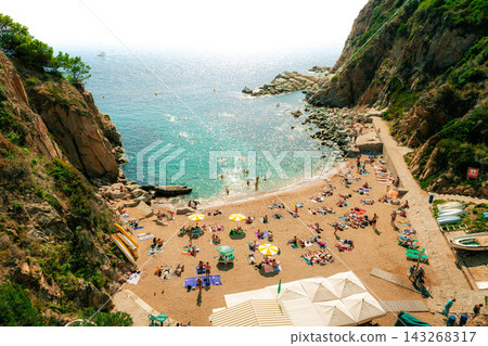 Hidden cala near Tossa de Mar on Costa Brava coastline in Spain. Mediterranean summer destination for coastal hiking beach holidays adventure travel and seaside tourism Hidden cala near Tossa de Mar on Costa Brava coastline in Spain. Mediterranean summer destination for coastal hiking beach holidays adventure travel and seaside tourism 143268317