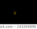 Full Moon Glowing Brightly in Deep Dark Night Sky for Astronomy and Celestial Concept Photography 143269896