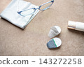 Contact lenses, glasses, and makeup. An image of getting ready in the morning. 143272258