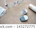 Contact lenses, glasses, and makeup. An image of getting ready in the morning. 143272775
