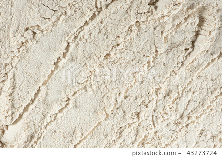 Abstract culinary background with natural flour powder texture overhead view Abstract culinary background with natural flour powder texture overhead view 143273724