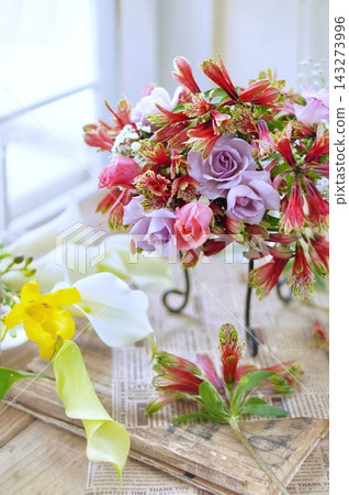 Arrangement of red flowers and roses Arrangement of red flowers and roses 143273996