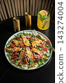 Salad with Pear, Arugula, Jamon, Blue Cheese and Blueberry, Delicious Fresh Salad Appetizer on Bright Background 143274004