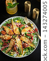 Salad with Pear, Arugula, Jamon, Blue Cheese and Blueberry, Delicious Fresh Salad Appetizer on Bright Background 143274005