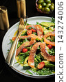 Salad with salted salmon and arugula 143274006