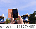 Inuyama City, Aichi Prefecture, Japan: Spring Inuyama Festival under a beautiful blue sky; floats gathered in front of Inuyama Castle Square; tourists taking photos with their smartphones. 143274465