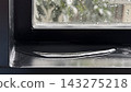 Water leaking from a condo window frame after heavy rain 143275218