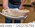 [#Food] A large piece of aged tuna with mold covering the surface. 143276794