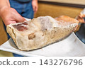 [#Food] A large piece of aged tuna with mold covering the surface. 143276796