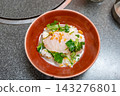 [#Cooking] A Japanese dish featuring elegantly presented sea bream rice porridge. 143276801