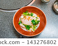 [#Cooking] A Japanese dish featuring elegantly presented sea bream rice porridge. 143276802