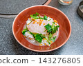 [#Cooking] A Japanese dish featuring elegantly presented sea bream rice porridge. 143276805