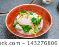 [#Cooking] A Japanese dish featuring elegantly presented sea bream rice porridge. 143276806