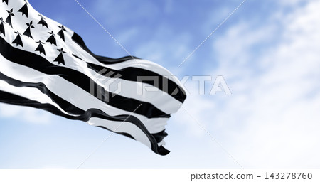 Brittany flag waving with french national flag on a clear day 143278760