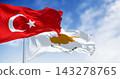 Turkish and cypriot national flags waving in the wind on a clear day 143278765