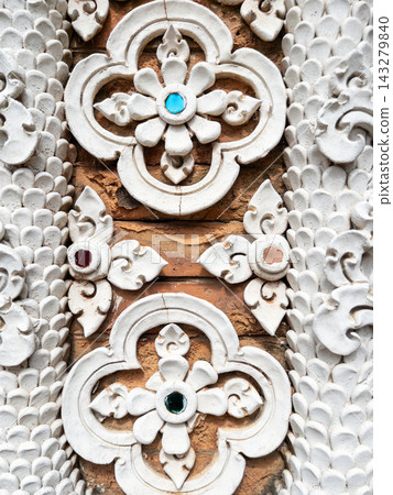 Traditional Thai Stucco Wall Pattern Decoration Traditional Thai Stucco Wall Pattern Decoration 143279840