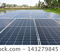 Floating solar panels generating clean renewable energy on water surface 143279845