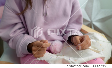 Serene stitching experience with warm lighting and tactile textures Serene stitching experience with warm lighting and tactile textures 143279860