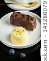 Delicious glazed curd snacks with fresh blueberries and mint on light grey table, closeup 143280079