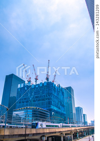 New and unusual views of Tokyo's urban landscape. Views include the Tokyo Torch under construction and express trains (vehicles being moved). 143281209