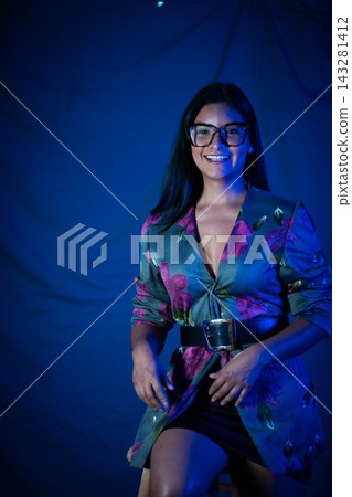 Smiling woman in floral blazer wearing glasses Smiling woman in floral blazer wearing glasses 143281412