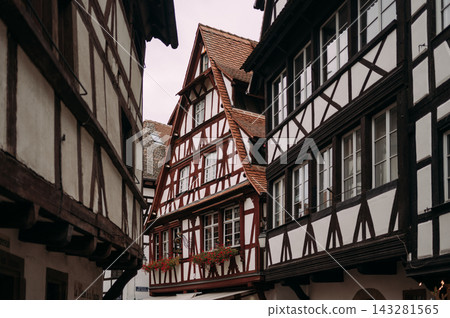 Traditional half-timbered house facade in Strasbourg, Alsace, France Traditional half-timbered house facade in Strasbourg, Alsace, France 143281565