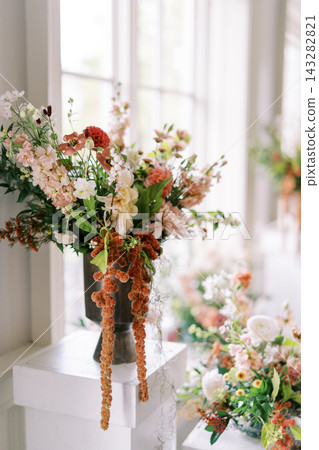 Sophisticated bouquet highlighted by gentle illumination and intricate details Sophisticated bouquet highlighted by gentle illumination and intricate details 143282821