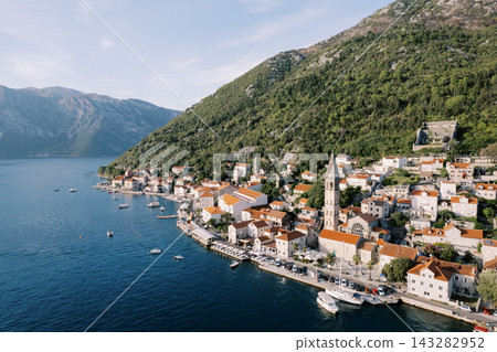 Aerial view of Perast coastline and mountains in Kotor, Montenegro Aerial view of Perast coastline and mountains in Kotor, Montenegro 143282952