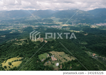 Aerial view of Monti hills and countryside in Filattiera, Massa-Carrara, Italy Aerial view of Monti hills and countryside in Filattiera, Massa-Carrara, Italy 143283226
