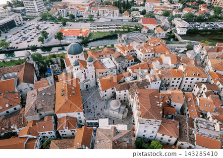 Mediterranean cityscape with historic charm. Medieval town with terracotta roofs and alleys Mediterranean cityscape with historic charm. Medieval town with terracotta roofs and alleys 143285410