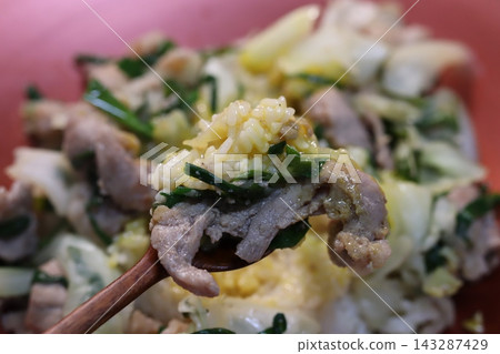Spoonful of Rice and Meat Dish Close-up Spoonful of Rice and Meat Dish Close-up 143287429