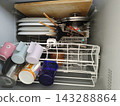 Dishes after a meal put in the dishwasher 143288864