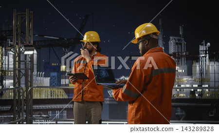 Offshore rig experts use AI on laptop monitoring drilling operations during oil crisis. Engineers use artificial intelligence powered anomaly detection system during geopolitical instability, camera A Offshore rig experts use AI on laptop monitoring drilling operations during oil crisis. Engineers use artificial intelligence powered anomaly detection system during geopolitical instability, camera A 143289828