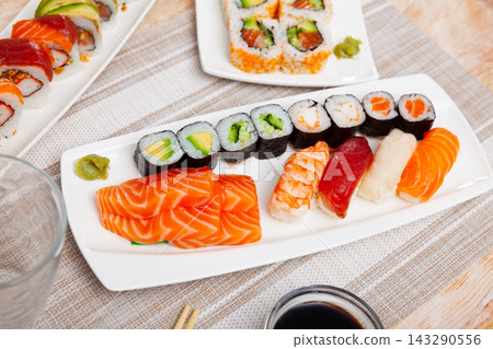 Sushi set with maki rolls and nigiri Sushi set with maki rolls and nigiri 143290556