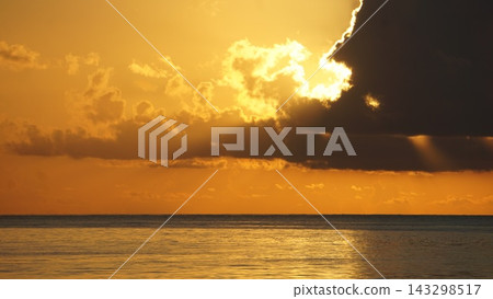 A golden sunset shining over a romantic sea A golden sunset shining over a romantic sea 143298517