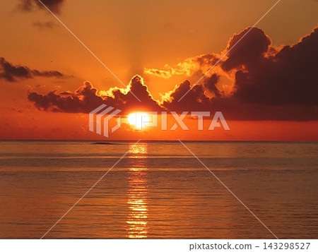 Sunset view of the orange sky and sea Sunset view of the orange sky and sea 143298527