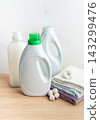 Laundry detergent bottles and cotton towels for household cleaning 143299476