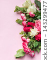 Pink roses and eucalyptus framing pastel background 143299477