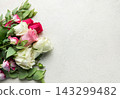 Roses bouquet with eucalyptus leaves on concrete background 143299482