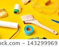 Painting tools on a yellow background 143299969