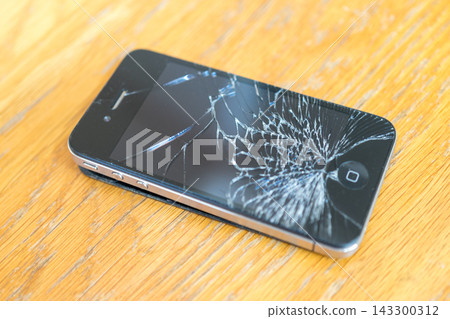cracked smartphone screen cracked smartphone screen 143300312