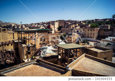 Panoramic view over the rooftops and historic skyline of Fes Panoramic view over the rooftops and historic skyline of Fes 143304355