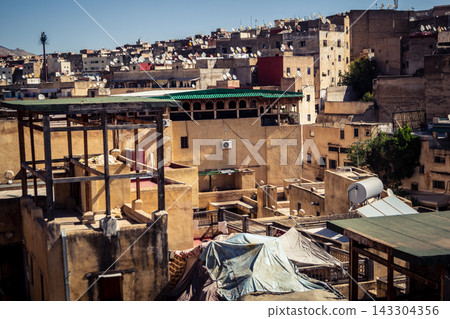 Panoramic view over the rooftops and historic skyline of Fes Panoramic view over the rooftops and historic skyline of Fes 143304356