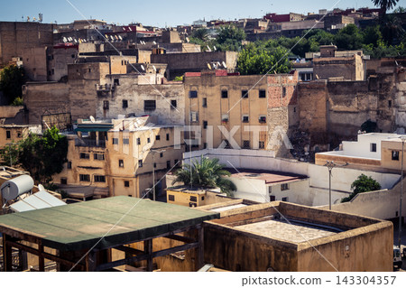 Panoramic view over the rooftops and historic skyline of Fes Panoramic view over the rooftops and historic skyline of Fes 143304357