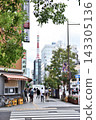 Tokyo Tower visible at the end of the sidewalk in Hamamatsucho 143305136